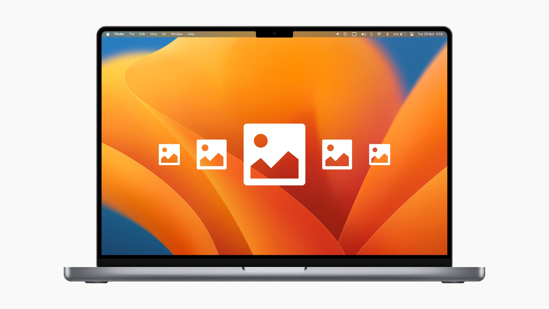 MacBook desktop with the official macOS Ventura wallpaper