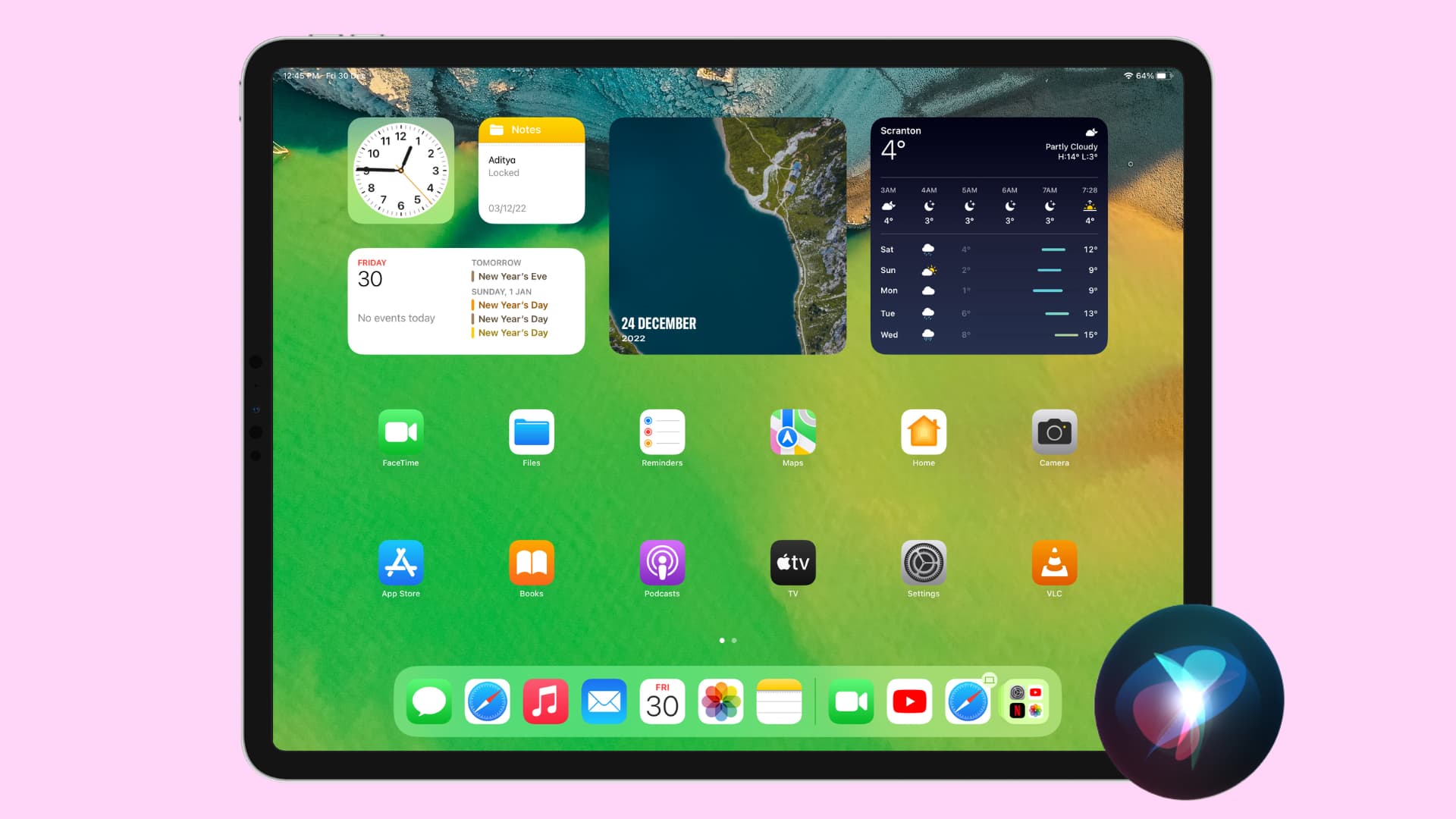 iPad Home Screen with Siri icon in the bottom