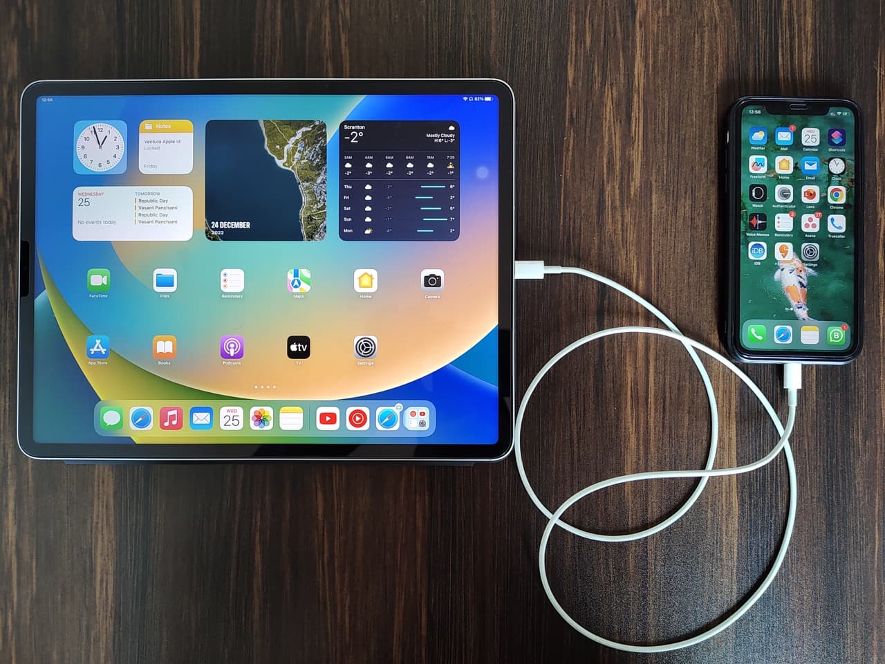iPhone connected to iPad using a USB-C to Lightning cable