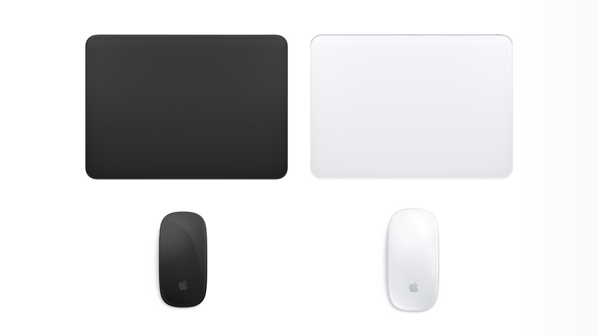Magic Mouse and Magic Trackpad in both black and white colors