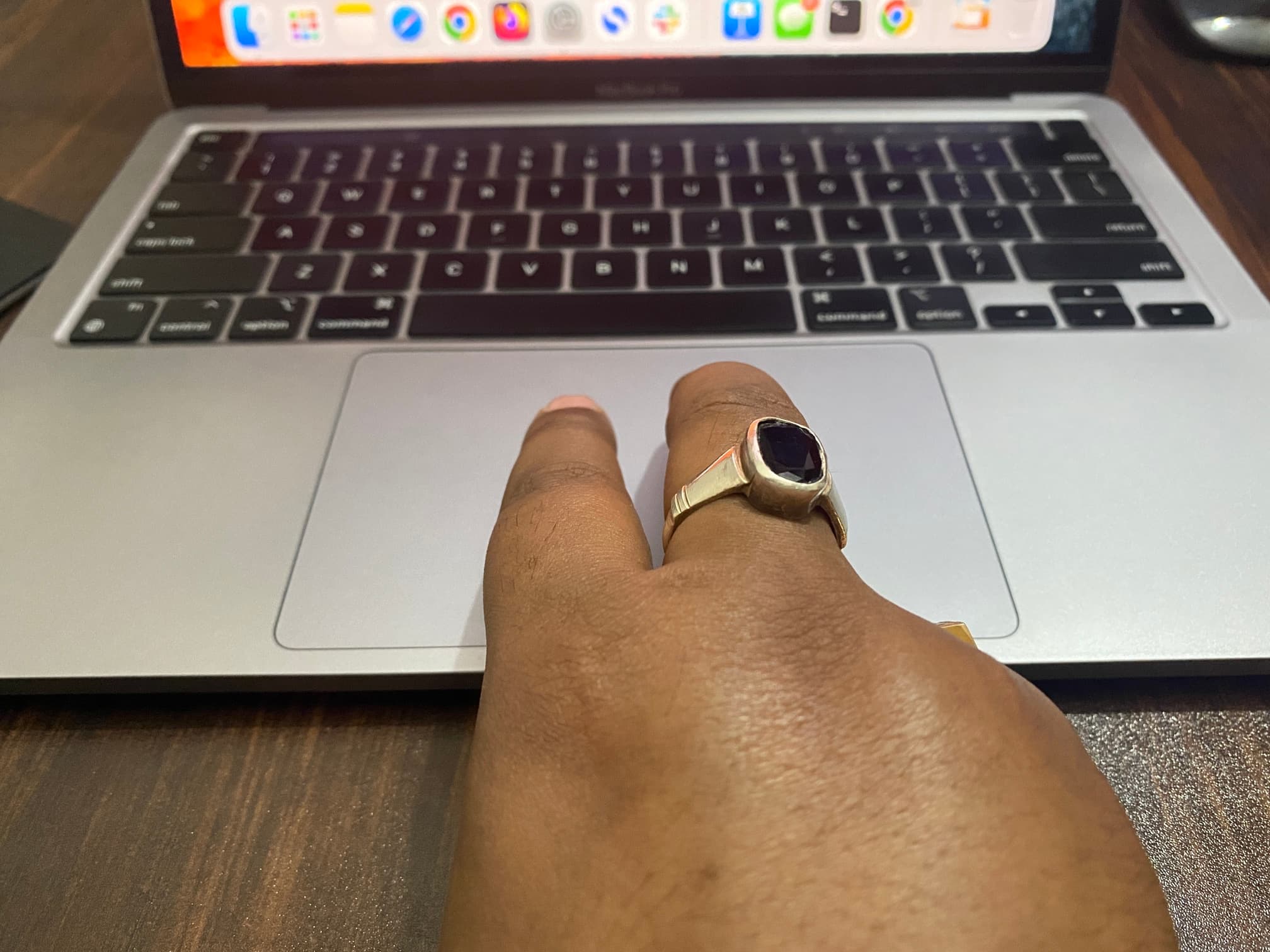 Right-click with two fingers on MacBook trackpad