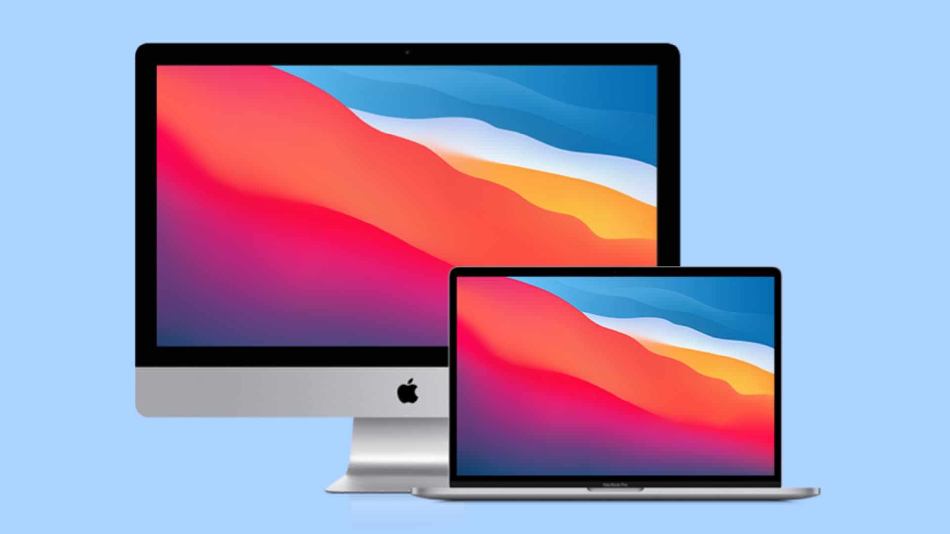 Old iMac and MacBook with red, orange, and blue wallpaper