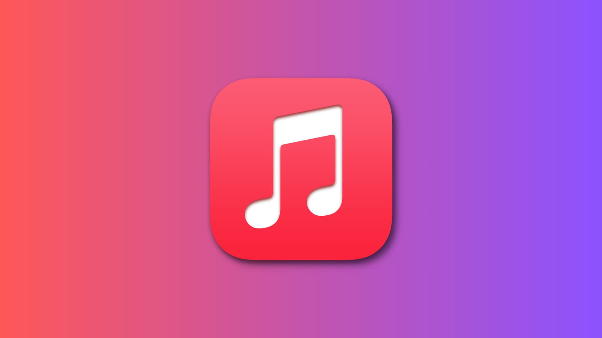 Apple Music app icon on a red and purple gradient background.