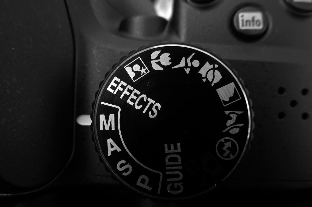 Camera photography mode selector dial.
