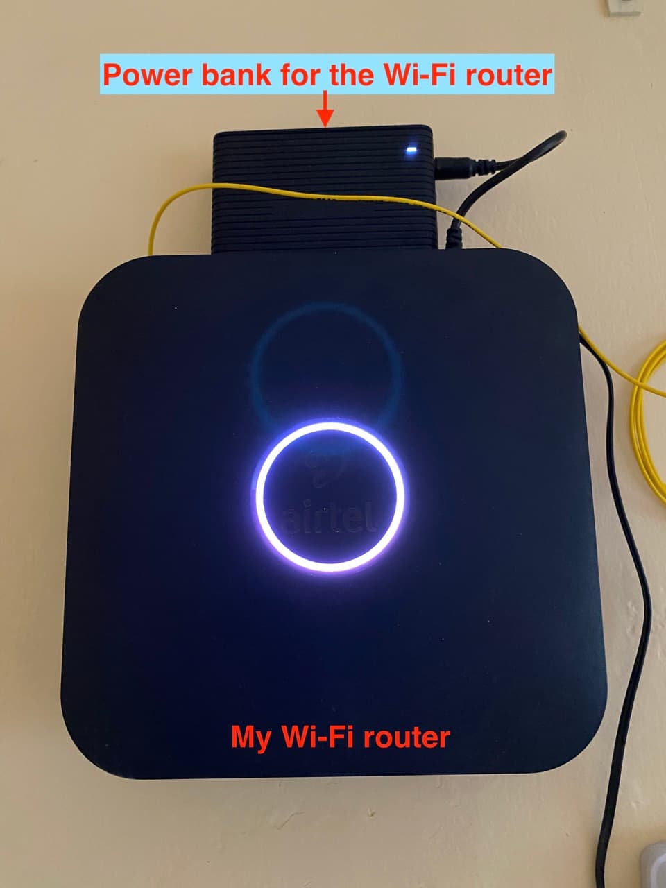 Wi-Fi router with power bank connected to it