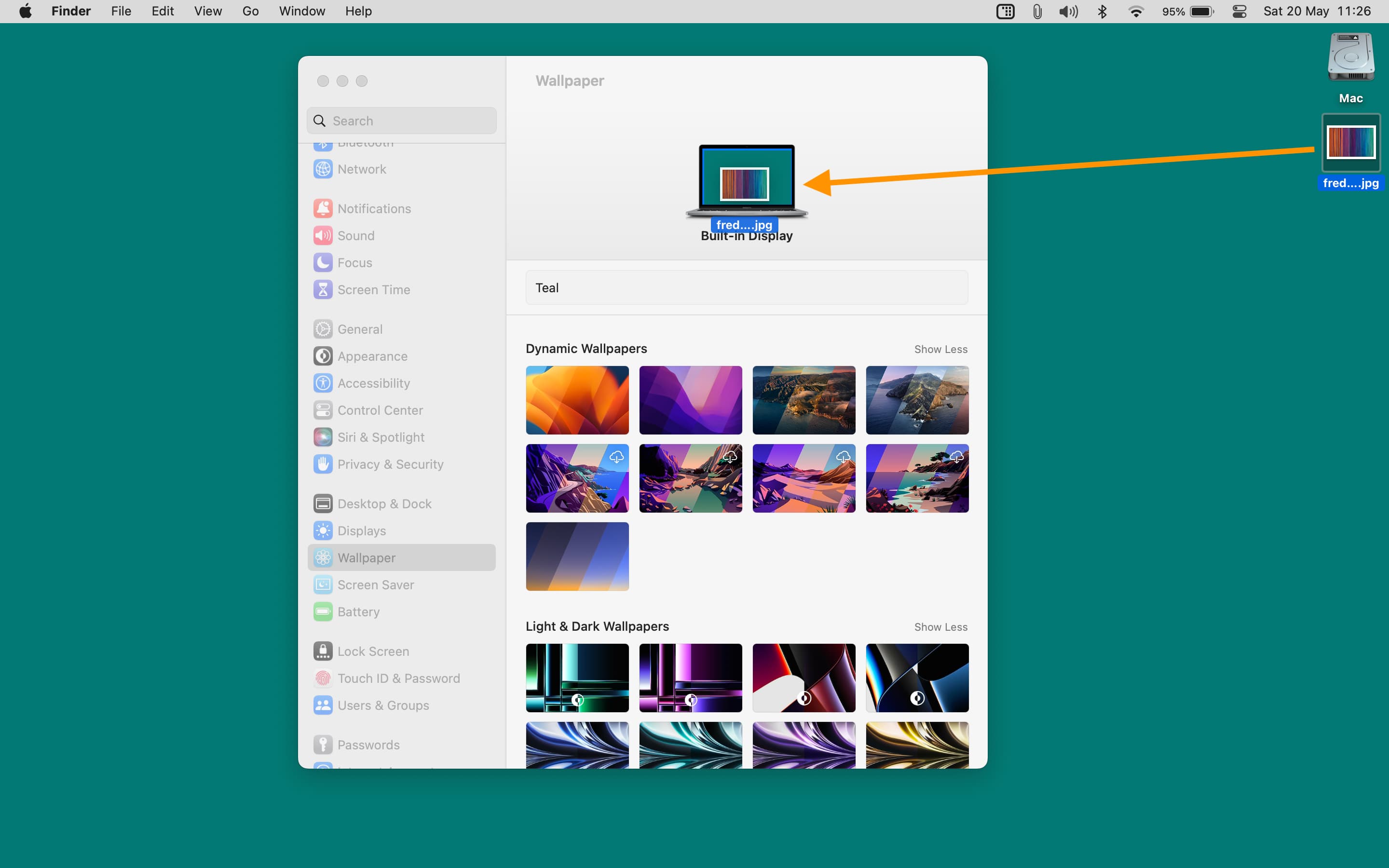 Drag and drop an image from Desktop on the current wallpaper thumbnail to set it as the new Mac desktop background