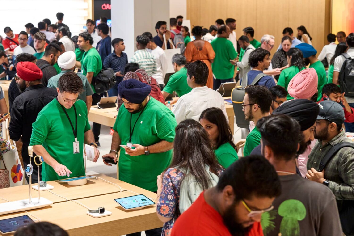 Interior shot of Apple's retail store in New Delhi showcasing crowds on opening day