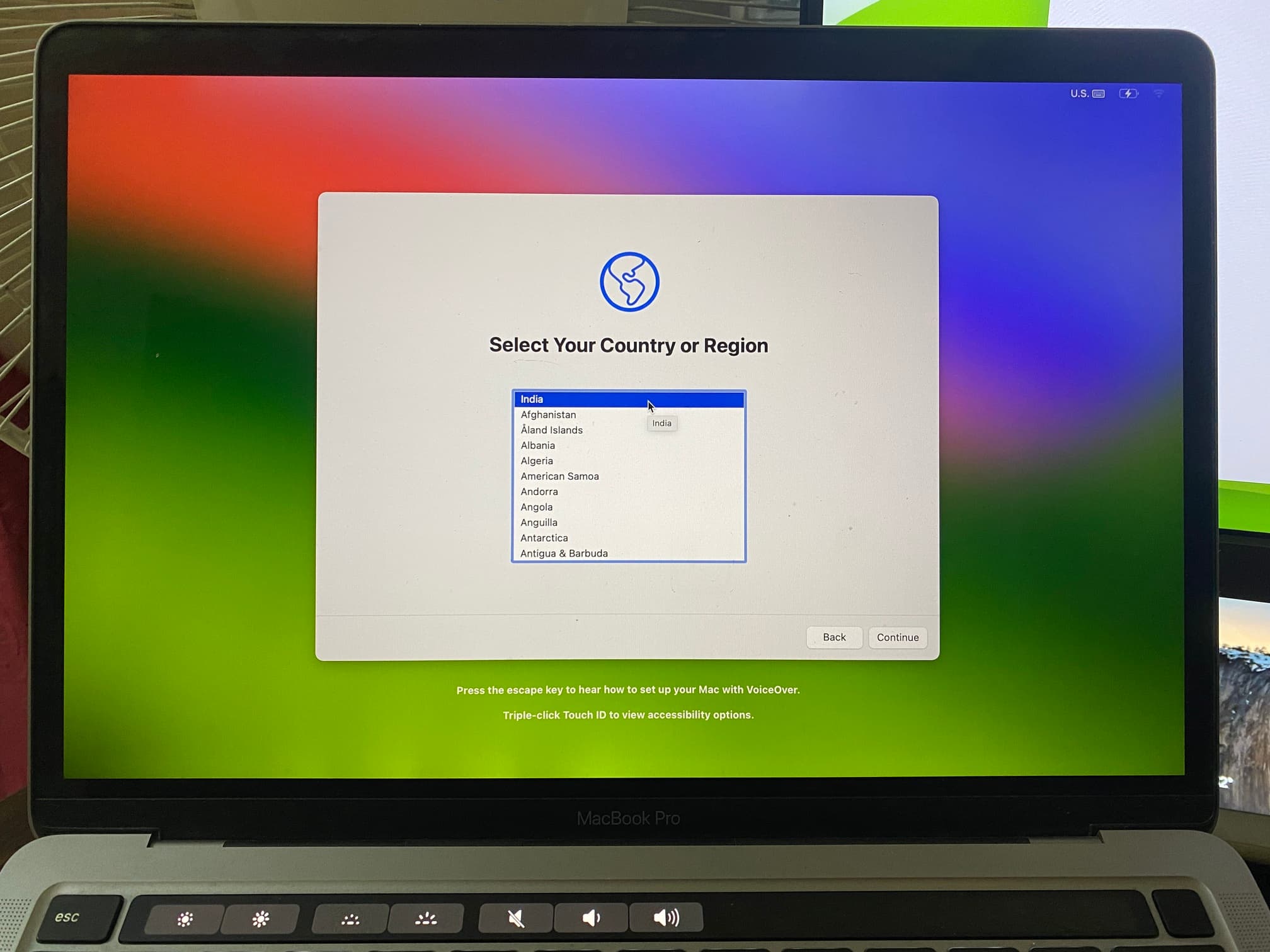 MacBook on macOS Sonoma initial setup screen