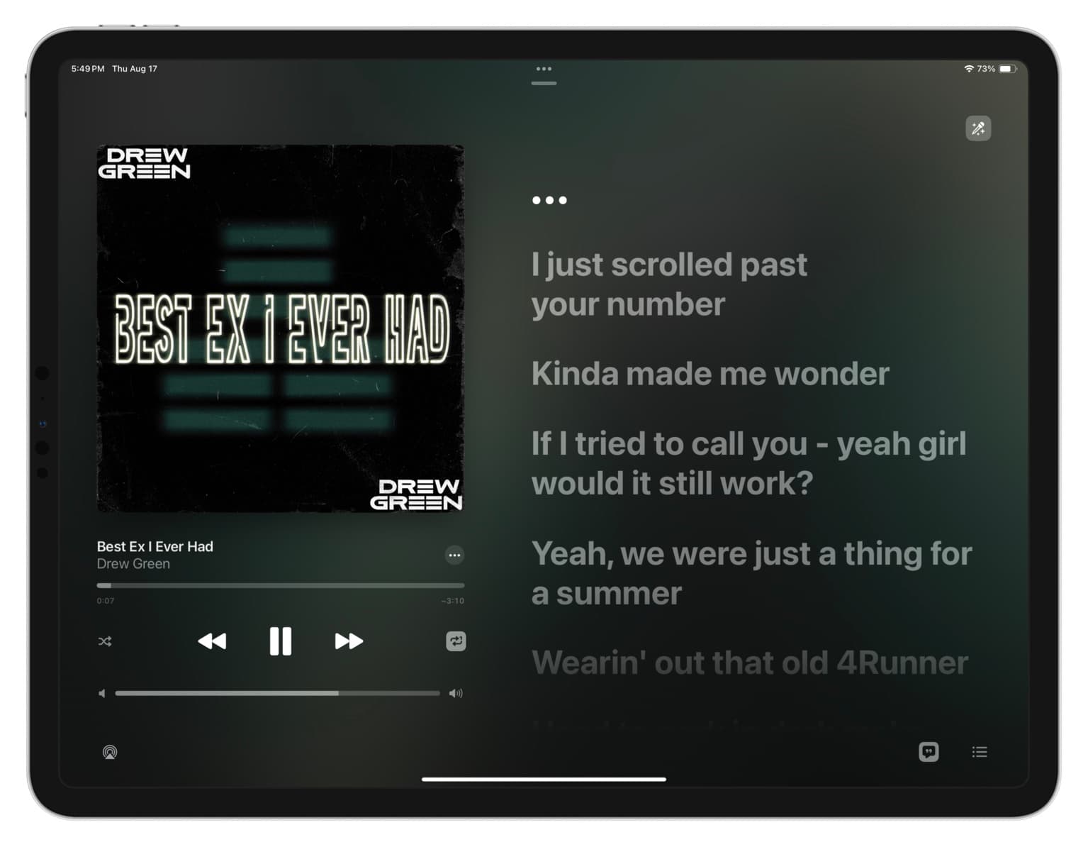 Apple Music lyrics and controls on iPad in landscape orientation