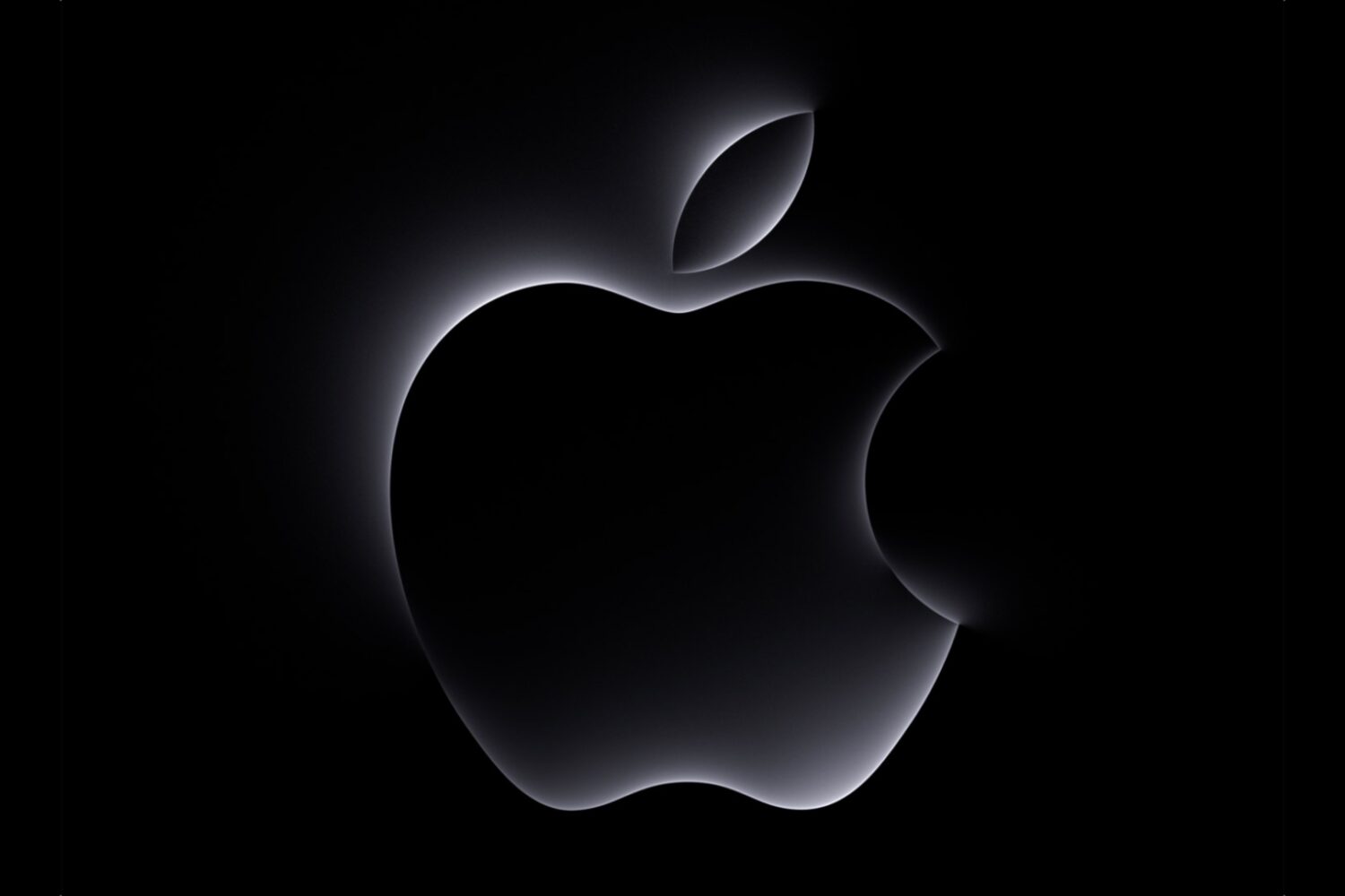 Glowing white Apple logo outline set against a solid black background