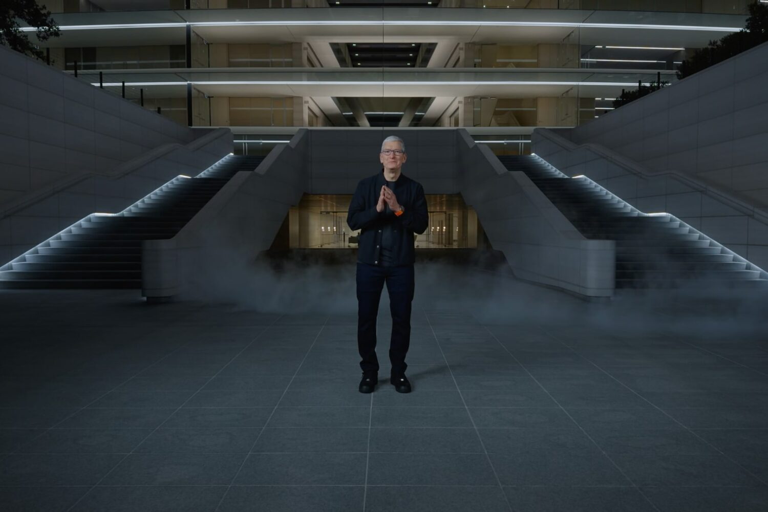 Tim Cook standing in front of the Apple Park entrance
