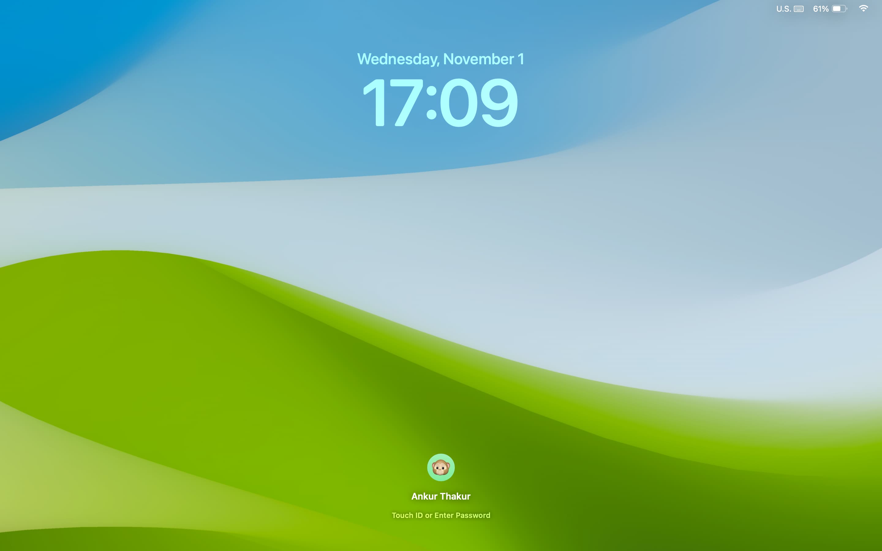 Mac Lock Screen showing green blue wallpaper