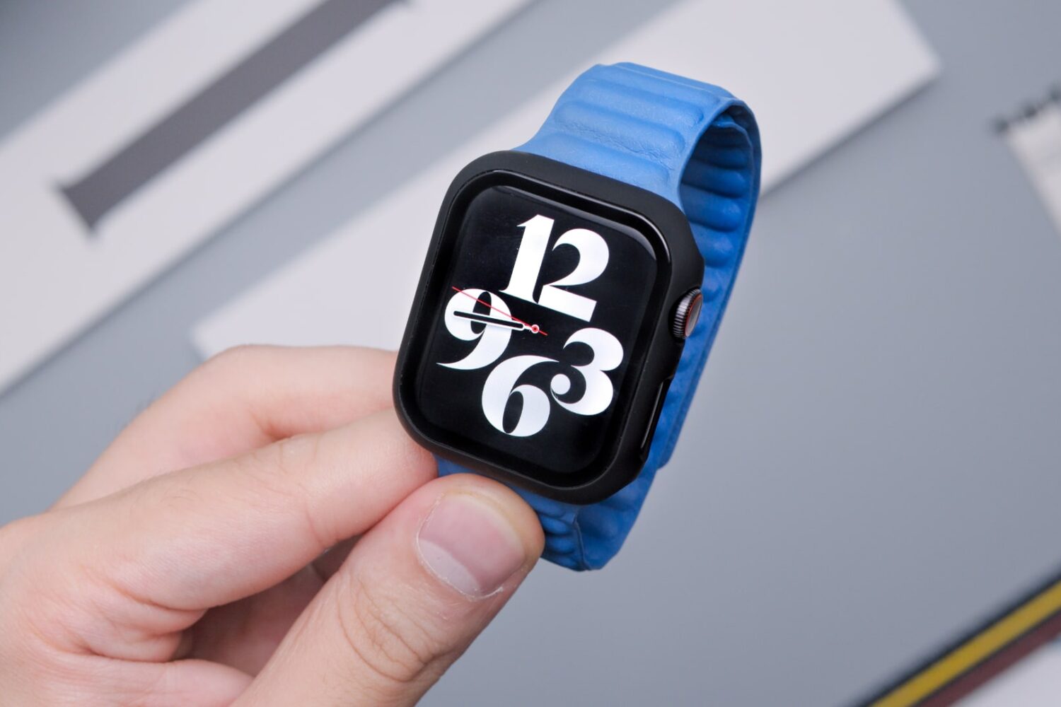Apple Watch Series 7 with a blue band and case