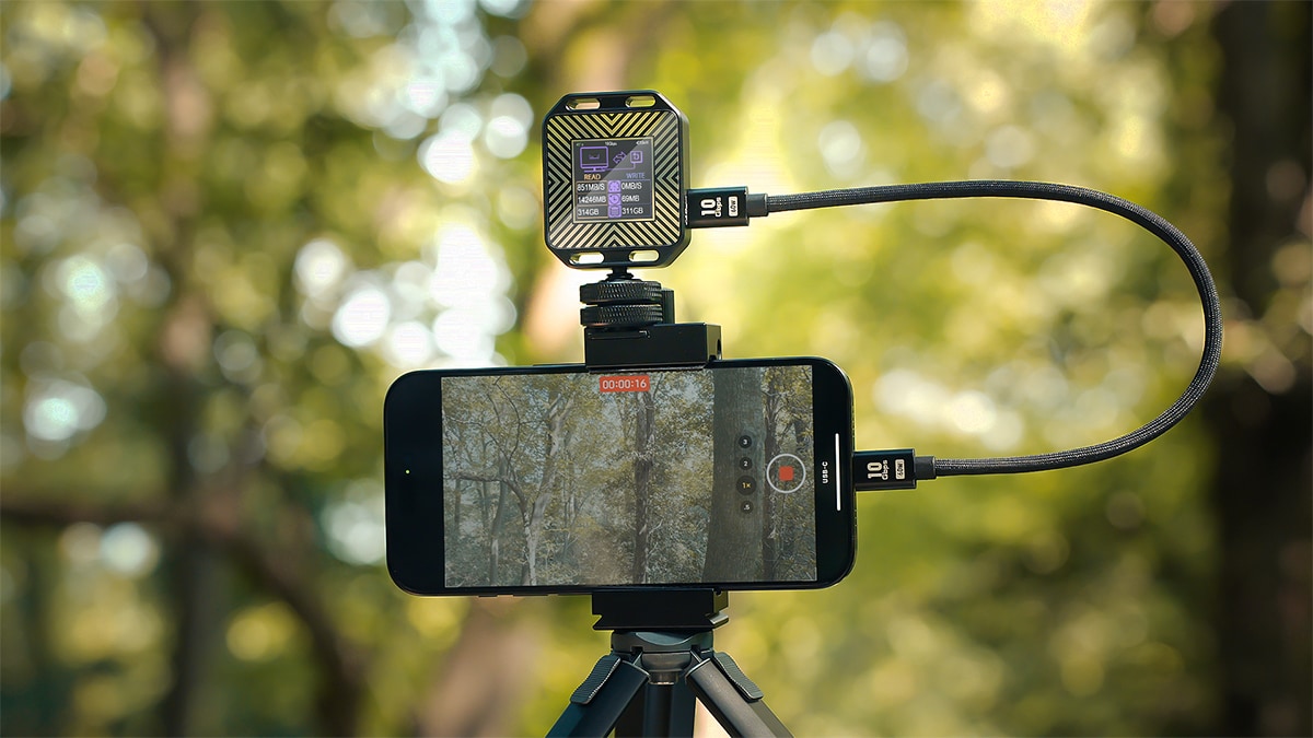 DockCase SSD enclosure and iPhone 15 Pro mounted on smartphone tripod