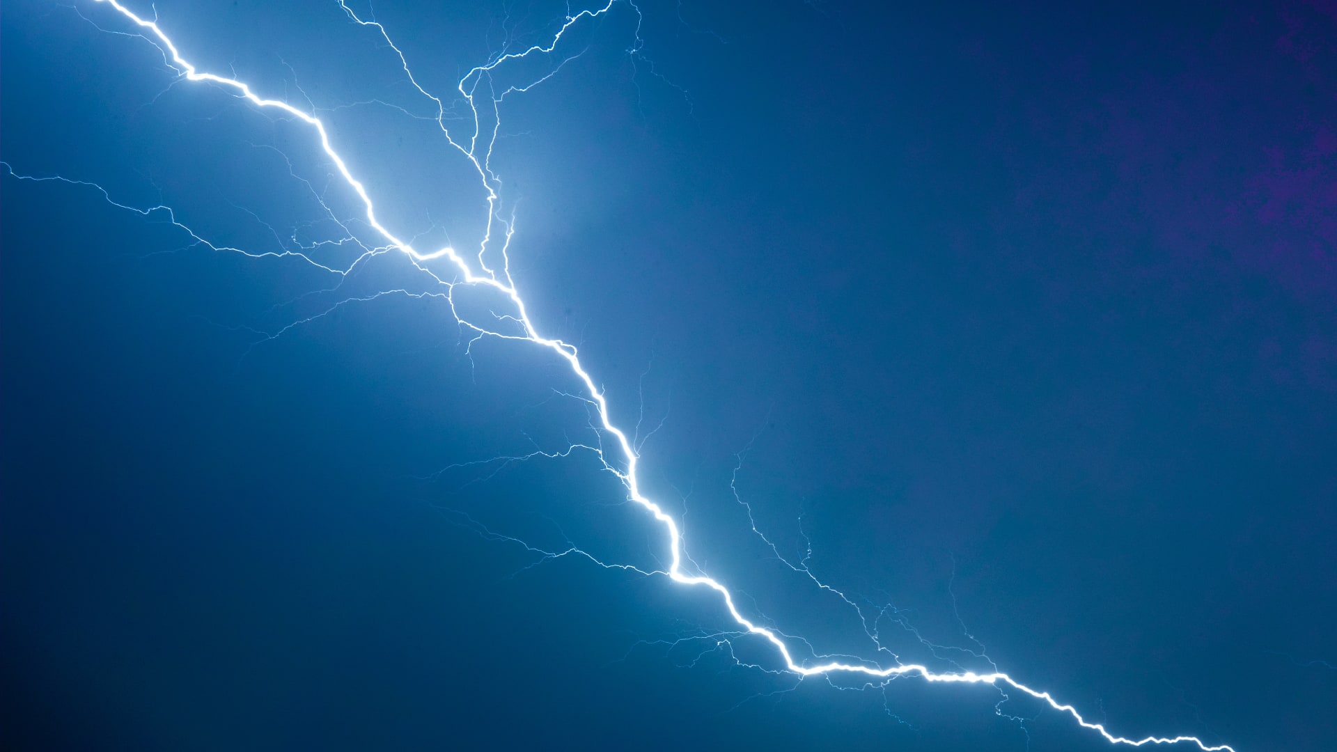 Lightning bolt strikes in the sky during storm