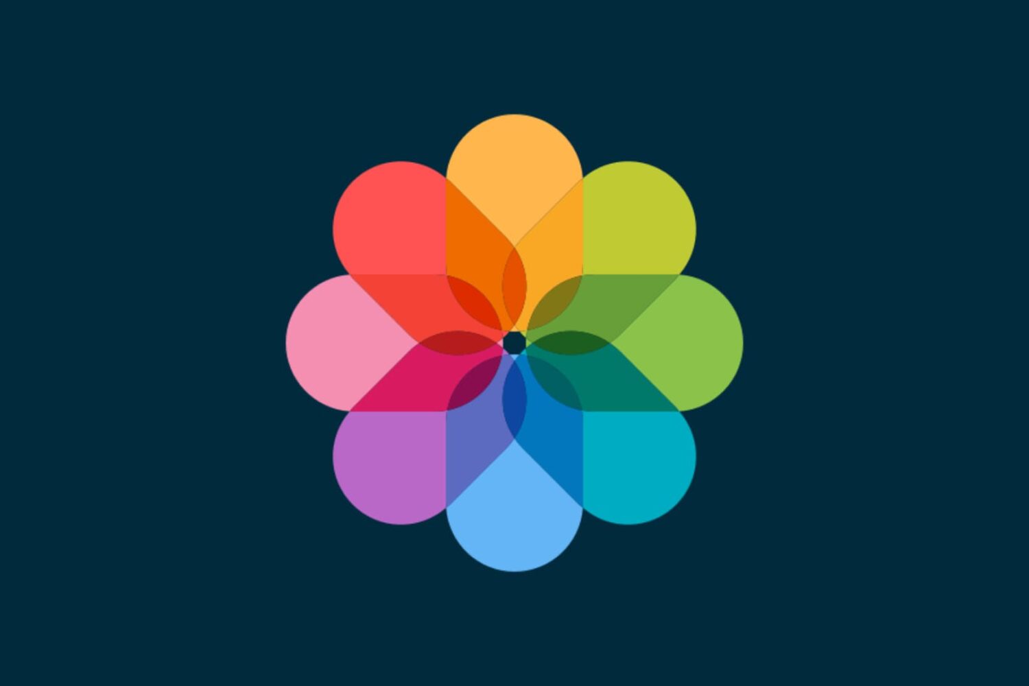 Apple Photos app icon on a dark background