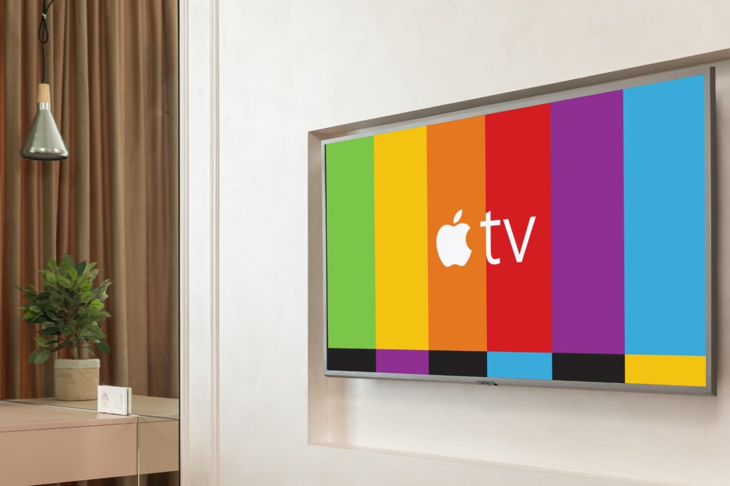 Apple TV on colored strip background