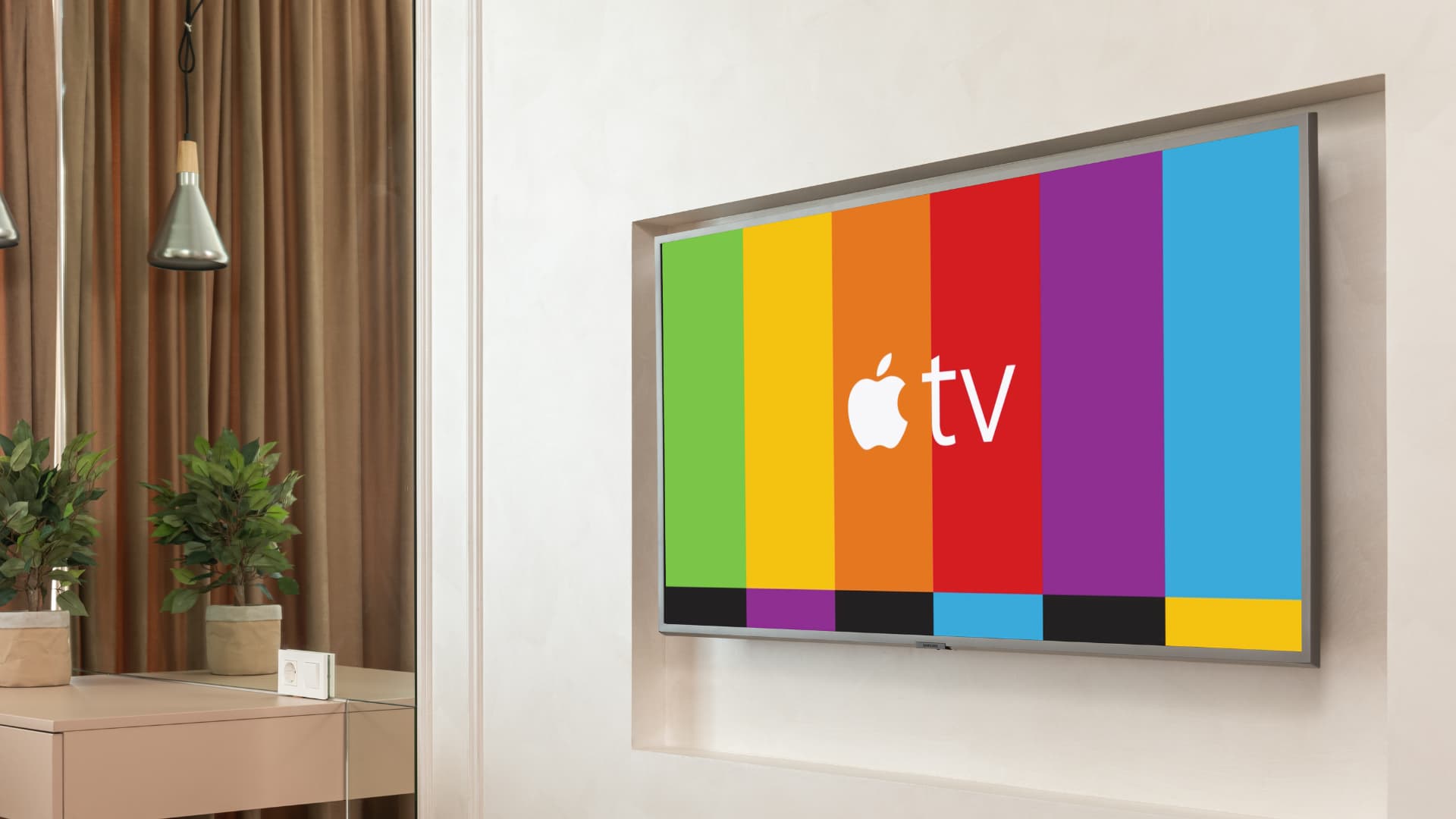 Apple TV on colored strip background