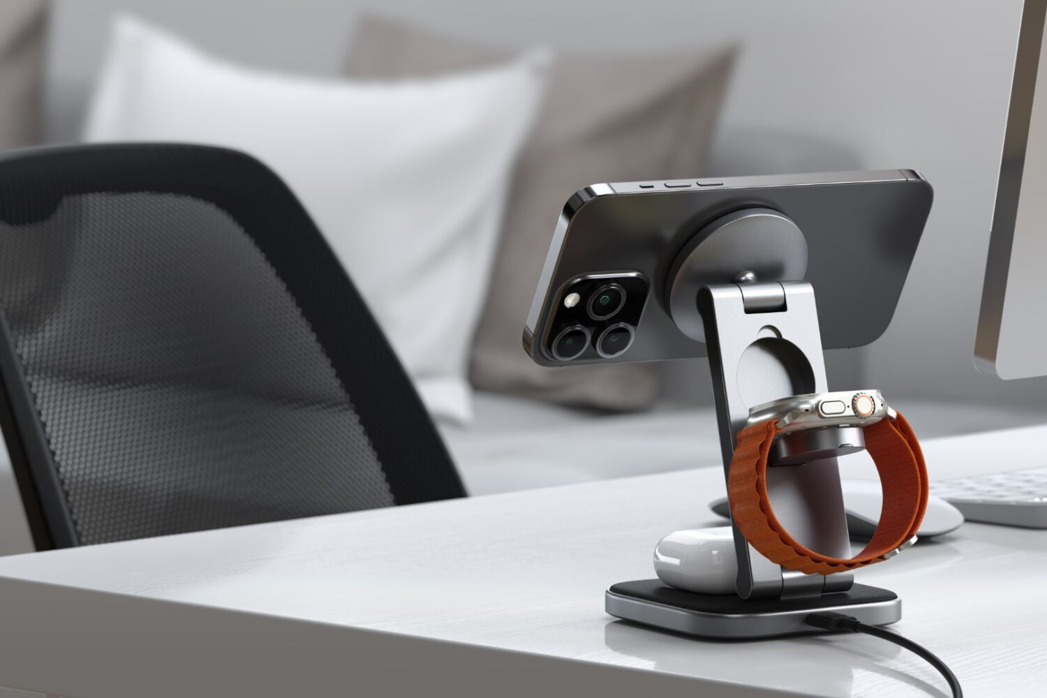The back of Satechi's charging stand with an iPhone, AirPods and Apple Watch on it