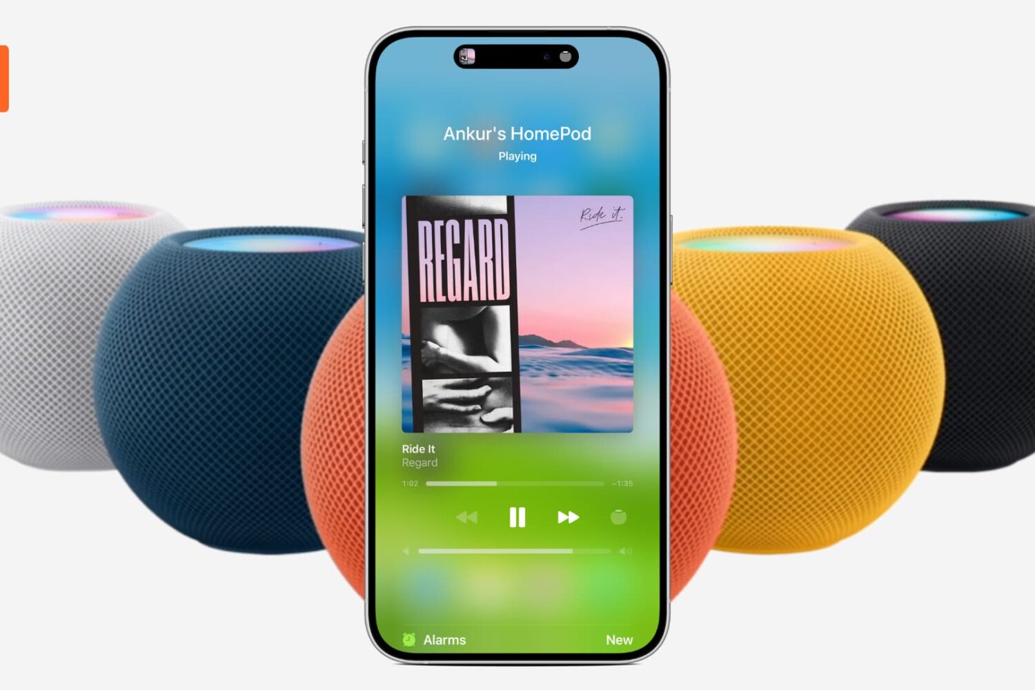 iPhone showing what's playing on HomePod with several HomePod minis in the background
