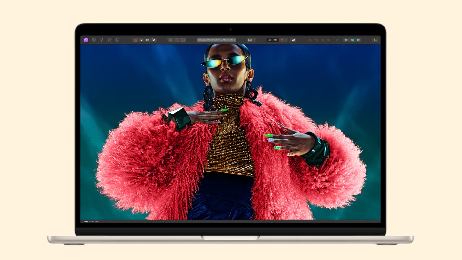 MacBook with a female model on the screen